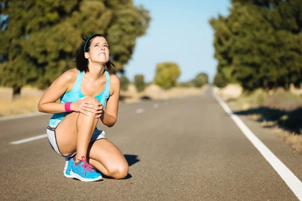 Running knee pain — Stockfoto