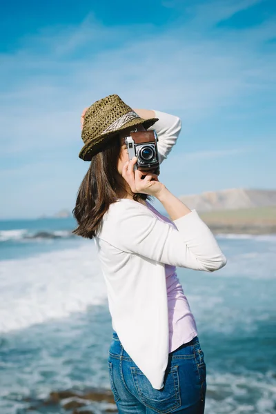 Funky woman taking photo on travel — Stock Photo, Image