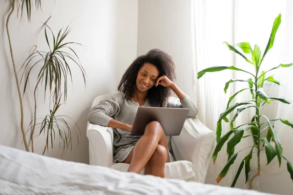 Relaxed Casual Afro Hairstyle Woman Using Laptop Home Her Bedroom Stockbild