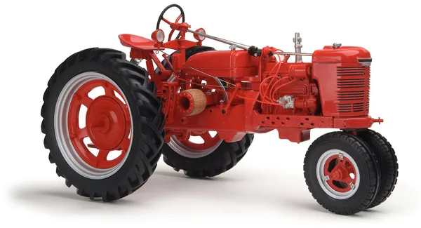Tractor rojo sobre fondo blanco — Foto de Stock