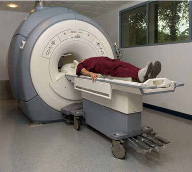 Patient about to enter a magnetic resonance imaging machine
