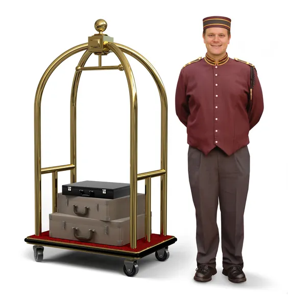 Bellhop com carrinho de bagagem — Fotografia de Stock