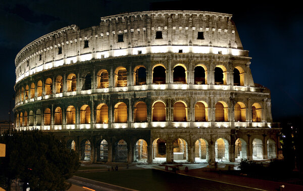 A photo of Rome's colliseum at night