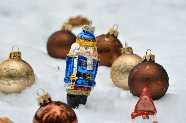 Nutcracker in snow — Stock Photo, Image