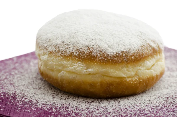 Donut på lila servett — Stockfoto