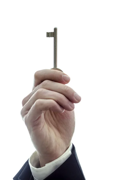 Mężczyzna trzymający klucz — Zdjęcie stockowe