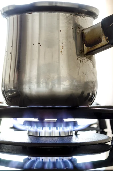 Coffee pot on a gas stove — Stock Photo, Image