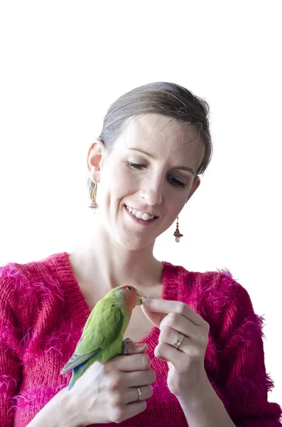 Mulher segurando seu papagaio — Fotografia de Stock