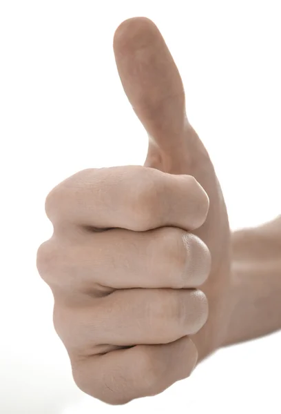 Primer plano de una mano con el pulgar hacia arriba signo —  Fotos de Stock