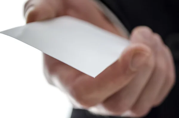 Detail of a visit card in a male hand — Stock Photo, Image