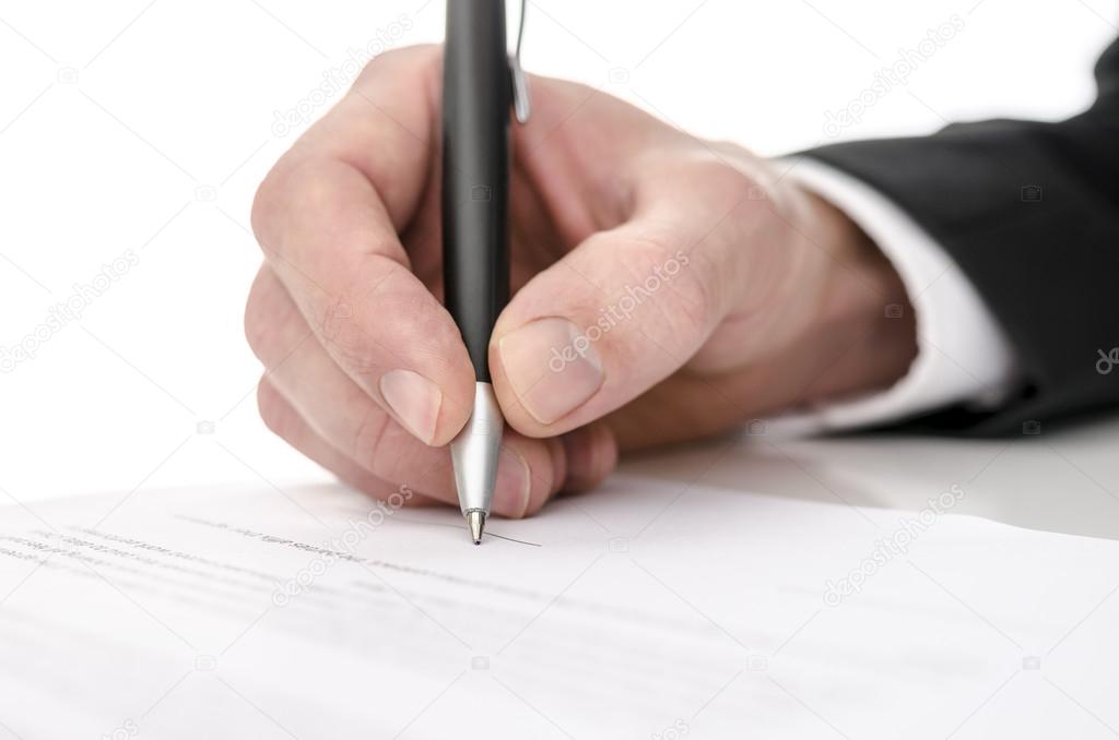 Business man signing a contract