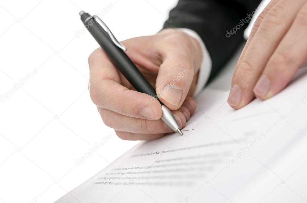 Business man signing a contract