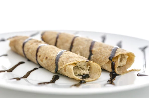 Side view of decorated pancakes on a plate — Stock Photo, Image