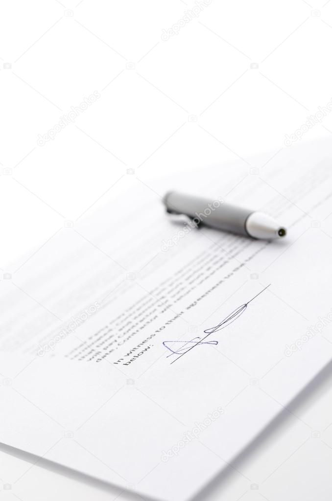 Contract and a pen
