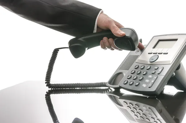 Male hand hanging up phone — Stock Photo, Image