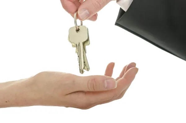 Handover of house keys Stock Photo