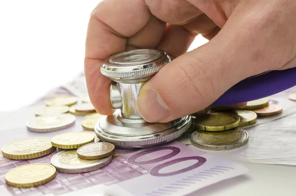 Stethoscope on European currency — Stock Photo, Image