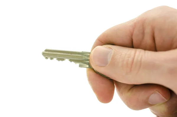 Detail of hand holding a house key — Stock Photo, Image