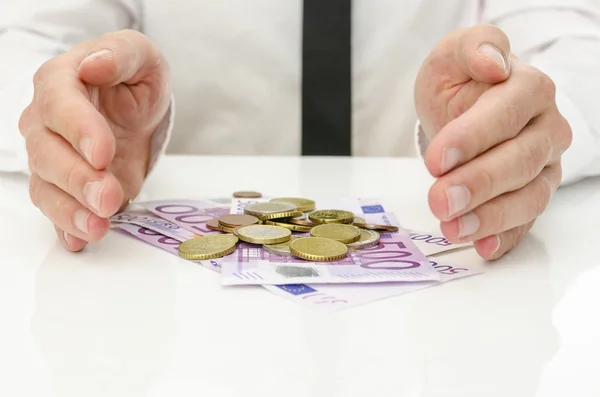 Male hands around Euro money — Stock Photo, Image