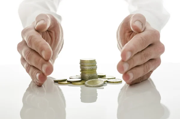 Male hands around Euro coins — Stock Photo, Image