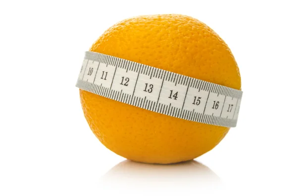 Orange fruit wrapped with measuring tape — Stock Photo, Image