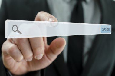 Arama çubuğu işaret eden işadamı