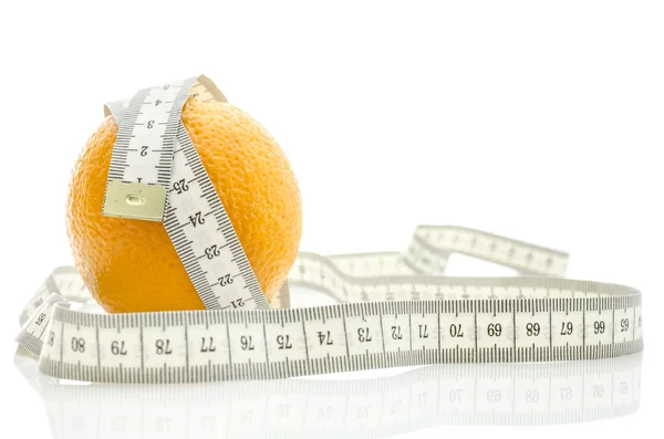 Fresh orange with measuring tape — Stock Photo, Image