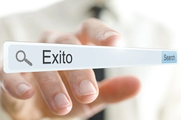 Word Exito written in search bar. Spanish for success. — Stock Photo, Image