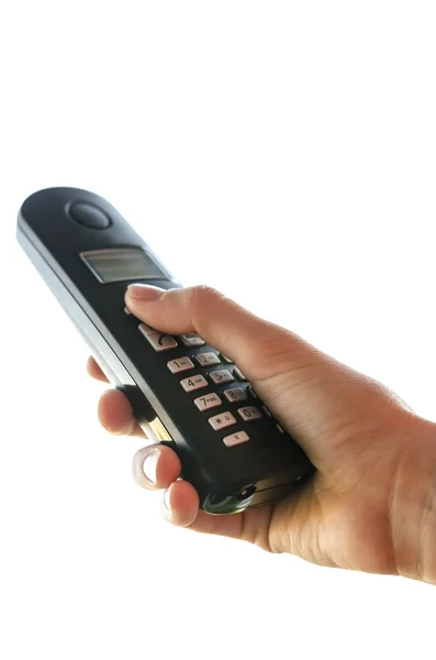 Holding portable telephone handset — Stock Photo, Image