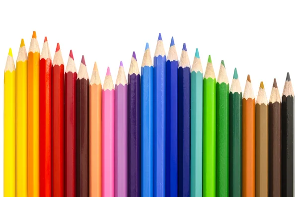Lápis coloridos fazendo uma onda — Fotografia de Stock