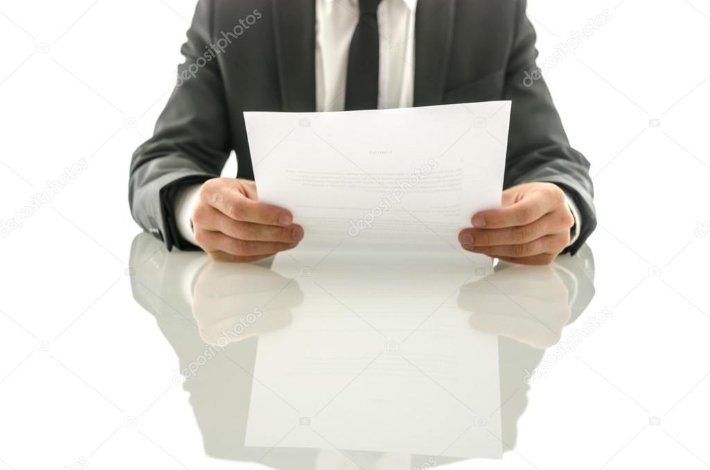 Businessman reading important document
