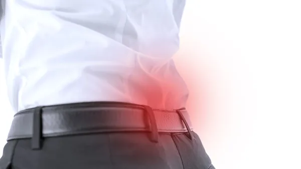 Closeup of lower back pain — Stock Photo, Image