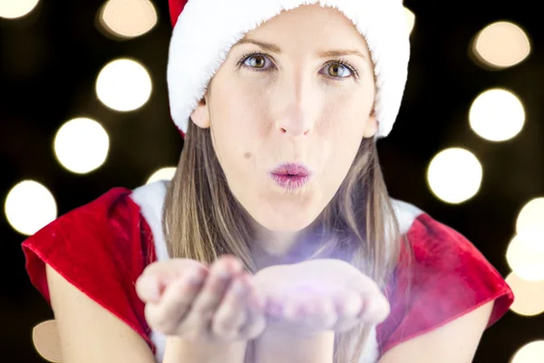 Miss Babbo Natale che soffia polvere di desiderio magica su di voi — Foto Stock