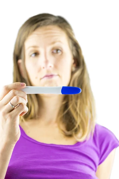 Olhando decepcionado no teste de gravidez — Fotografia de Stock