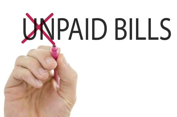 Changing phrase Unpaid bills into Paid bills — Stock Photo, Image