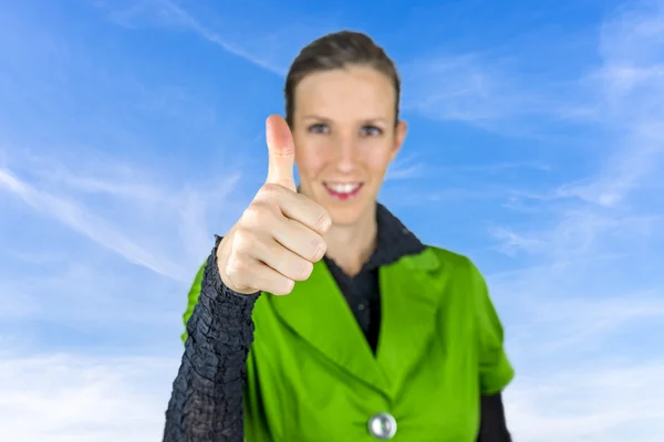 Thumbs up sign over blue sky. — Stock Photo, Image