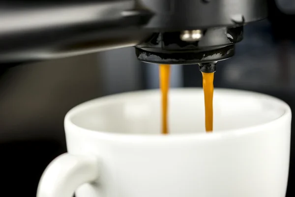 Machine making a coffee