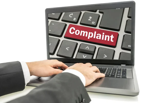 Businessman responding to a complaint — Stock Photo, Image