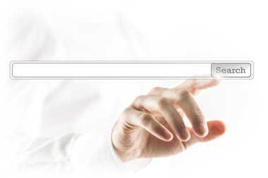 Man touching a search bar on a virtual screen