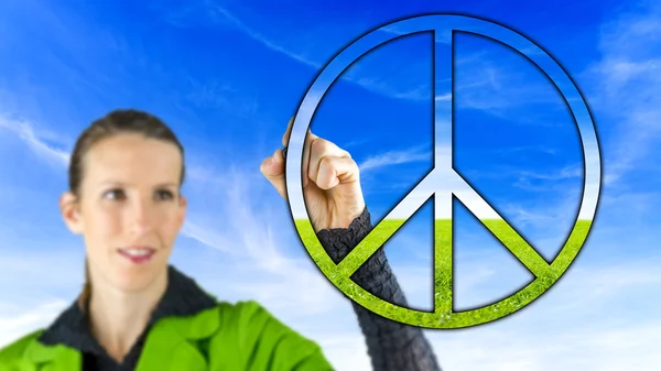 Woman with a peace sign — Stock Photo, Image