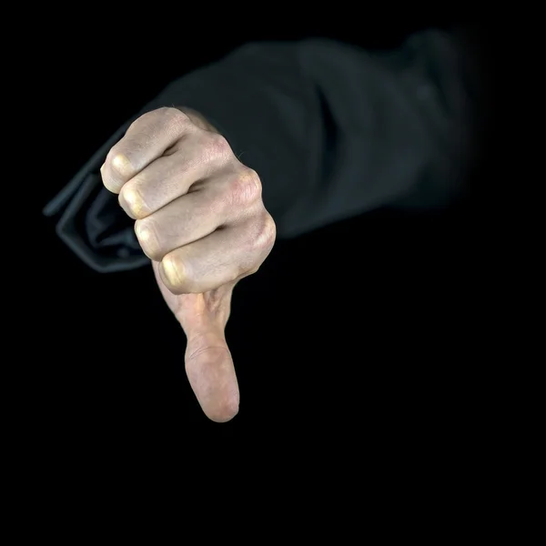 Hand showing the thumb down, on black background — Stock Photo, Image