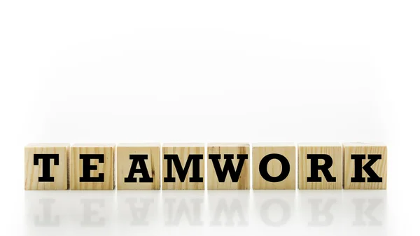 The word Teamwork on wooden cubes — Stock Photo, Image