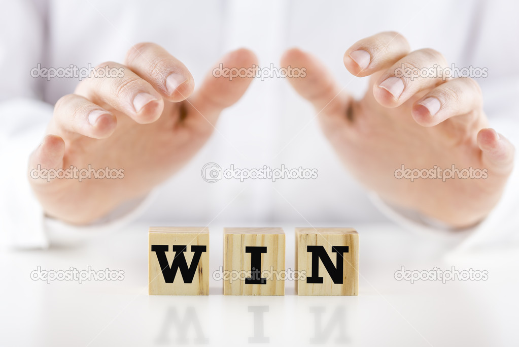 The word - Win - on wooden blocks