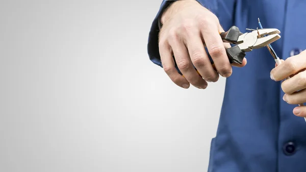 Workman repairing an electrical cable — Stock Photo, Image