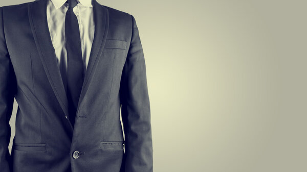 Businessman in a suit, torso view
