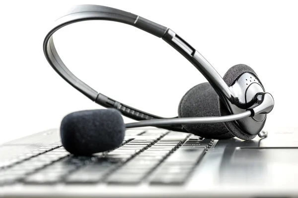 Headset on a laptop computer — Stock Photo, Image