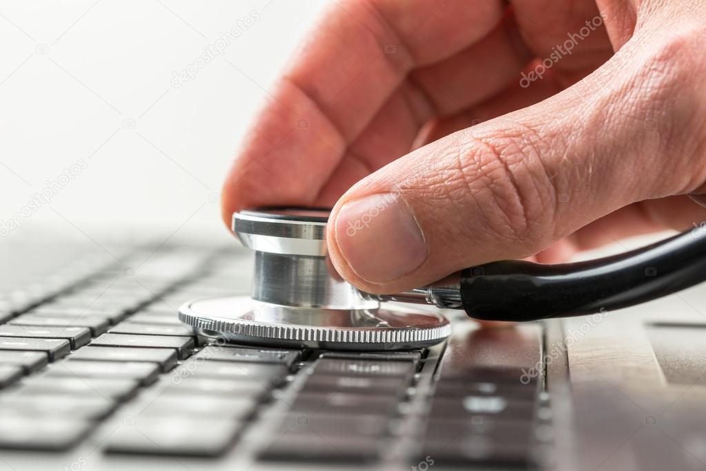 Man checking the health of his laptop computer