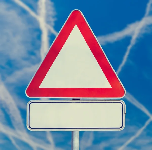 Blank triangular traffic sign — Stock Photo, Image