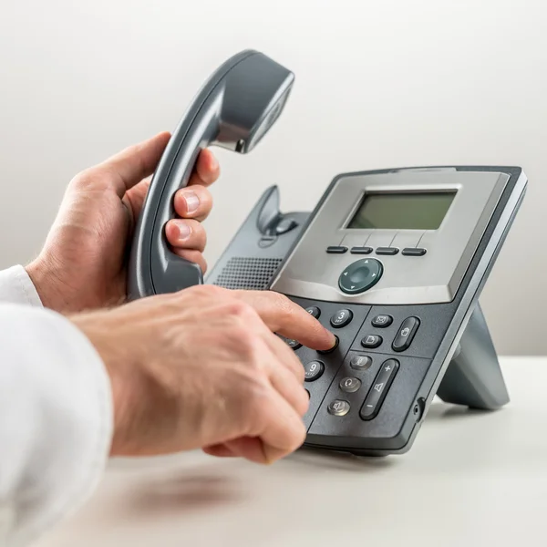Dialaing a telephone number. — Stock Photo, Image
