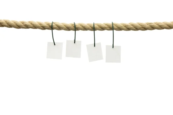 Blank cards haning off frayed rope — Stock Photo, Image